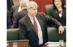 Robin Campbell, Alberta Minister of Finance, pauses for reflection before delivering the provincial budget speech at the Alberta Legislature on March 26, 2015.