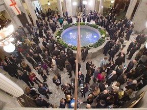 The rotunda is packed with media, politicians, etc. after the Alberta Budget 2015 was tabled at the Legislature in Edmonton, March 26, 2015.