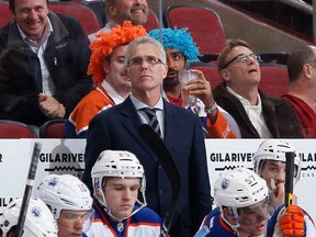 With Oilers fans closely scrutinizing his every move, Craig MacTavish signed contracts or extensions with key young players Nail Yakupov (L), Leon Draisaitl (2nd from L), and Ryan Nugent-Hopkins (R). David Perron (2nd from R) was acquired by trade during MacT's tenure, then dispatched in similar manner.