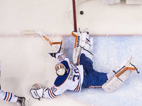 Fittingly, Edmonton Oilers' season ended with the puck in their net, an all-too-common occurrence for the NHL's worst defensive team. This overtime goal by Vancouver's Alex Edler consigned the Oil to their 58th loss of the year.