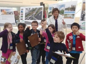 Some Grade 1 and 2 students from Laurier Heights School give a thumbs up Wednesday to the idea of a river valley funicular. The students were on a field trip to City Hall.