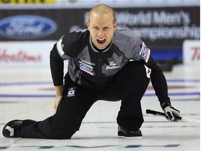 Canada's Pat Simmons shouts down the ice during the world men's curling championship against China in Halifax on Sunday, March 29, 2015. Canada defeated China 7-4. THE CANADIAN PRESS/ho-Michael Burns