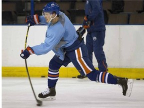 Edmonton Oilers Matt Fraser (28) shoots during practice on April 6, 2015 in Edmonton.