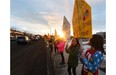 Students from Bessie Nichols and Sister Annata Brockman schools came out with signs urging motorists to slow down in the school zone during a rally in west Edmonton on Monday March 9, 2015.