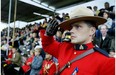 Then constable Lee Johnston, twin brother of slain RCMP officer Leo Johnston, salutes the RCMP Musical Ride, holding a special performance in Mayerthorpe on Aug. 30, 2005, as a tribute to the four slain Mounties.