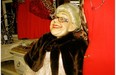 This laughing old woman statue greets visitors at the entrance to Caprice West.