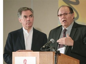Treaty 7 Grand Chief Charles Weaselhead speaks as Alberta Premier Jim Prentice listens at the Alberta First Nations Education Summit held Friday at the Ramada Hotel in Edmonton, where the Alberta government discussed initiatives to enhance education for First Nations students on reserve.