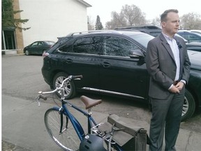 Tyler Golly, general supervisor of sustainable transportation with the City, explains the new protected bike lanes on 102 and 83 Ave.