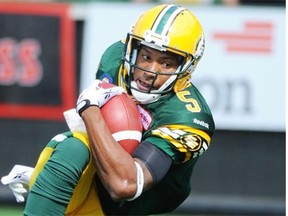 QB Pat White keeps and scores in the first half during a game between the Edmonton Eskimos and Toronto Argonauts in Commonwealth Stadium in Edmonton on Saturday Aug. 23, 2014.