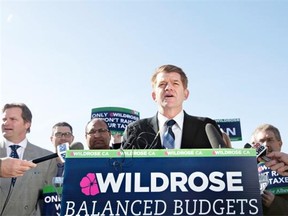 Wildrose Leader Brian Jean speaks about Wildrose priorities and their financial plan during a campaign stop in Edmonton on Thursday, April 9, 2015. THE CANADIAN PRESS/Jason Franson