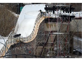 Workers continue putting together the Crashed Ice track at the Shaw Conference Centre in Edmonton on Friday March 6, 2015.