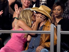 ARLINGTON, TX - APRIL 19:  Brittany Kerr kisses husband Jason Aldean after he wins the award for Male Vocalist of the Year during the 50th Academy Of Country Music Awards at AT&T Stadium on April 19, 2015 in Arlington, Texas.  (Photo by Ethan Miller/Getty Images for dcp.)