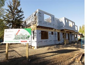A new and active multi-family dwelling construction site on the northeast corner of 127th Street and 106th Avenue on May 21, 2015.