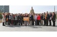 Alberta NDP Leader Rachel Notley rallied with supporters near the Alberta Legislature (in background) on May 4, 2015, one day before Albertans go to the polls to elect a new government.