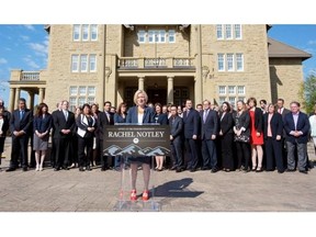 Alberta Premier-designate Rachel Notley addresses the media in front of her caucus at Government House on Saturday.