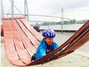 Andrew Woo, 5, enjoys a hammock on the urban beach at New Westminster’s thriving Pier Park