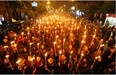 Armenians walk with torches to the monument to the victims of mass killings by Ottoman Turks, in Yerevan, Armenia, Friday, April 24, 2015.