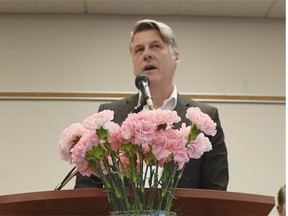 AUPE president Guy Smith speaks during the International Day of Mourning for workers killed and injured on the job, at AUPE offices in Edmonton on Tuesday, April 28, 2015.