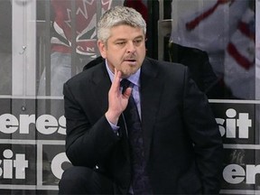 Canada head coach Todd McLellan watches the play during a Group A preliminary-round match against Switzerland at the world hockey championship on May 10, 2015 at the O2 Arena in Prague, Czech Republic.