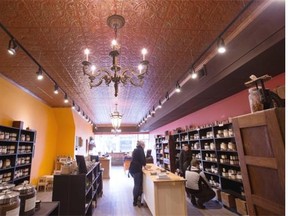 The new tin ceiling at The Silk Road Spice Merchant on Whyte Avenue adds rich, gleaming colour to the spicey interior. Greg Southam/Edmonton Journal