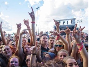 The crowd celebrate as The Smalls reunite to play the last day of Sonic Boom 2014.