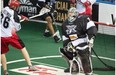 Daryl Veltman of the Calgary Roughnecks hits the crossbar against Edmonton Rush netminder Aaron Bold during Friday’s National Lacrosse League playoff game against the Edmonton Rush at Rexall Place.