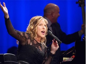 Diana Krall performs with bass player Dennis Crouch at the Jubilee Auditorium in Edmonton May 11, 2015.