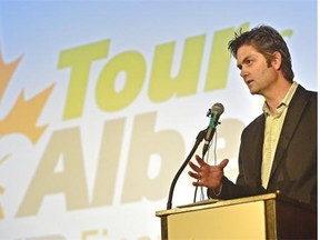 Duane Vienneau, executive director of the Tour of Alberta, announces that Stage 4 finishes in Jasper National Park during a news conference Wednesday at the Garneau Theatre.