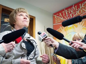 Edmonton Catholic school board chairwoman Debbie Engel speaks to reporters Thursday after trustee Patricia Grell criticized the board for its decision involving a transgendered elementary school student.