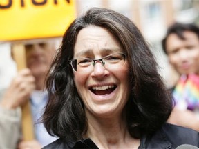 Edmonton Catholic School District trustee Patricia Grell outside the Edmonton Catholic Schools building in downtown Edmonton where a rally was held May 15, 2015, to recognize International Day Against Homophobia and Transphobia this weekend.