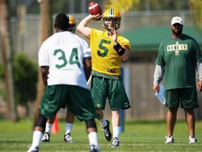 Edmonton Eskimos quarterback Jordan Lynch sets up to throw a pass as he runs through drills during the mini-camp at Historic Dodgertown in Vero Beach, Fla., on April 18, 2015.