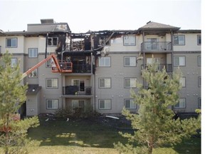 Fire investigators are still at the scene of the large condo fire that destroyed 100 units inside a building at 301 Clareview Station Drive West in Edmonton on Friday, May 22 in Edmonton. May 23, 2015.
