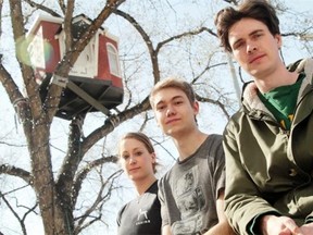 From left, Danielle Soneff, Sebastien Sauve-Hoover and Brad Comis of University of Alberta student design group Threshold Collective. Their Treehouses Project is an Edmonton Arts Council-funded transitory art project, and the work will be up in the trees around Churchill Square and City Hall through the summer.