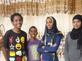 From left, Mohmaud Mohamed, Bilal Mohamed, Rahama Umar and Fatuma Mohamed. Rahama Umar has been on the wait list for a house for 2-1/2 years. She’s a working single mom with four kids, also paying off a student loan.