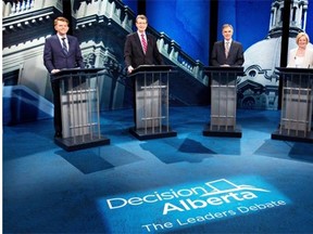 From left Wildrose party Leader Brian Jean, Liberal Leader David Swann, Alberta Progressive Conservative Leader Jim Prentice and NDP Leader Rachel Notley before leaders debate in Edmonton on Thursday April 23. Calgary academic Jack Mintz argues the Progressive Conservatives have a more balanced approach to preserve the Alberta advantage.