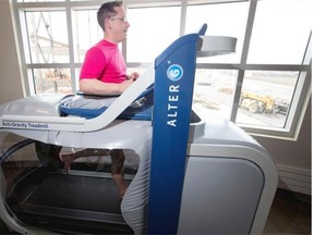 Grant Fedoruk, owner and president of Leading Edge Physiotherapy, gives his Windermere location’s Alter G anti-gravity treadmill a whirl.