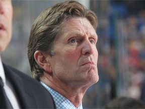 Head coach Mike Babcock of the Detroit Red Wings watches the action against the Buffalo Sabres on November 2, 2014 at the First Niagara Center in Buffalo, N.Y.
