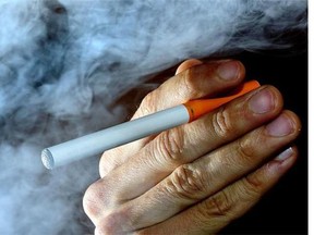 A person holds an electronic cigarette in a file photo.