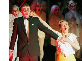 Bob L’Heureux (left) and Teresa Williams (right) in a scene from Strathcona High School’s production of The Addams Family