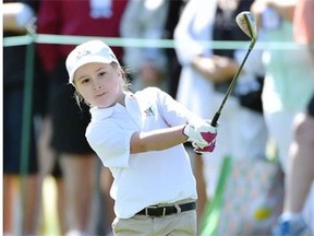 Jayla Kucy makes a chip shot in the Drive, Chip and Putt Championship at Augusta, Ga., in April 2015.