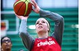 Katherine Plouffe and her twin sister Michelle playing on Canadian Women’s National Basketball team during a practice session at the Saville Centre in Edmonton, May 15, 2015.