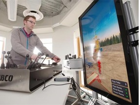 Jon Klippenstein, a programmer with Serious Labs demonstrates a scenario on the snubbing competency trainer at his Edmonton office last month.