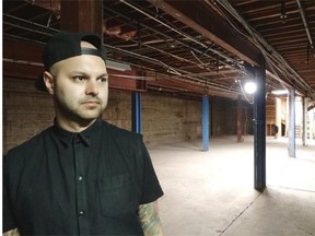 Kris Harvey stands in what will be The Chvrch of John, his new art bar in the basement of the Grand Hotel in Edmonton.