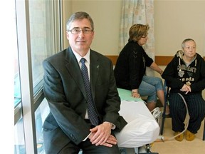 Dr. Jim Kutsogiannis (left), medical director of the Human Organ Procurement Exchange Program of Northern Alberta, pictured in 2014 with lung transplant patient Rick Galloway (right) and his wife Debbie. Kutsogiannis says he is encouraged by the progress of Alberta’s organ donor registry.