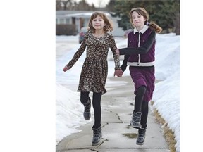 Laura (L) and Sarah Harder, 11. ED KAISER/EDMONTON JOURNAL