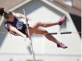 Lauren Ellis from Ross Sheppard High School tries to clear the bar in the pole vault event during the Edmonton high school track and field championships at Foote Field on Wednesday.
