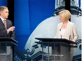 PC Leader Jim Prentice and NDP Leader Rachel Notley square off during the leaders’ debate in Edmonton’s Global television studio on April 23, 2015.