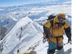 Mountain-climber Al Hancock climbing K2. The Edmonton-based mountaineer was nearly buried by an avalanche triggered by the Nepalese earthquake Saturday.