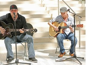 Nathan Cunnungham (left) and Richard Woodman (right) perform a song at Edmonton City Hall on May 13, during the announcement of the Aboriginal Day Live Celebration that will take place at Louise McKinney Riverfront Park in Edmonton on June 20.