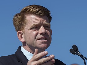 Wildrose Leader Brian Jean held a press conference on a plan to shrink hospital wait times, outside the Grey Nuns Hospital in Edmonton, April 20, 2015.